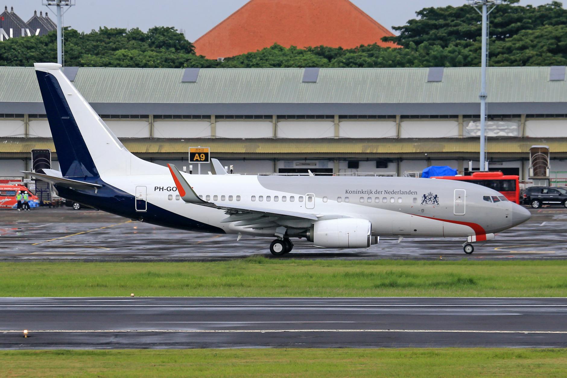 A government airplane of the Netherlands on the runway at an airport, ready for takeoff.