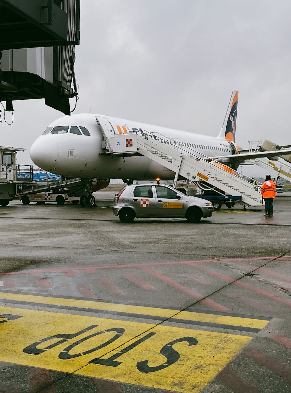 Passenger jet preparing for boarding at Orio al Serio Airport in Lombardia, Italy.