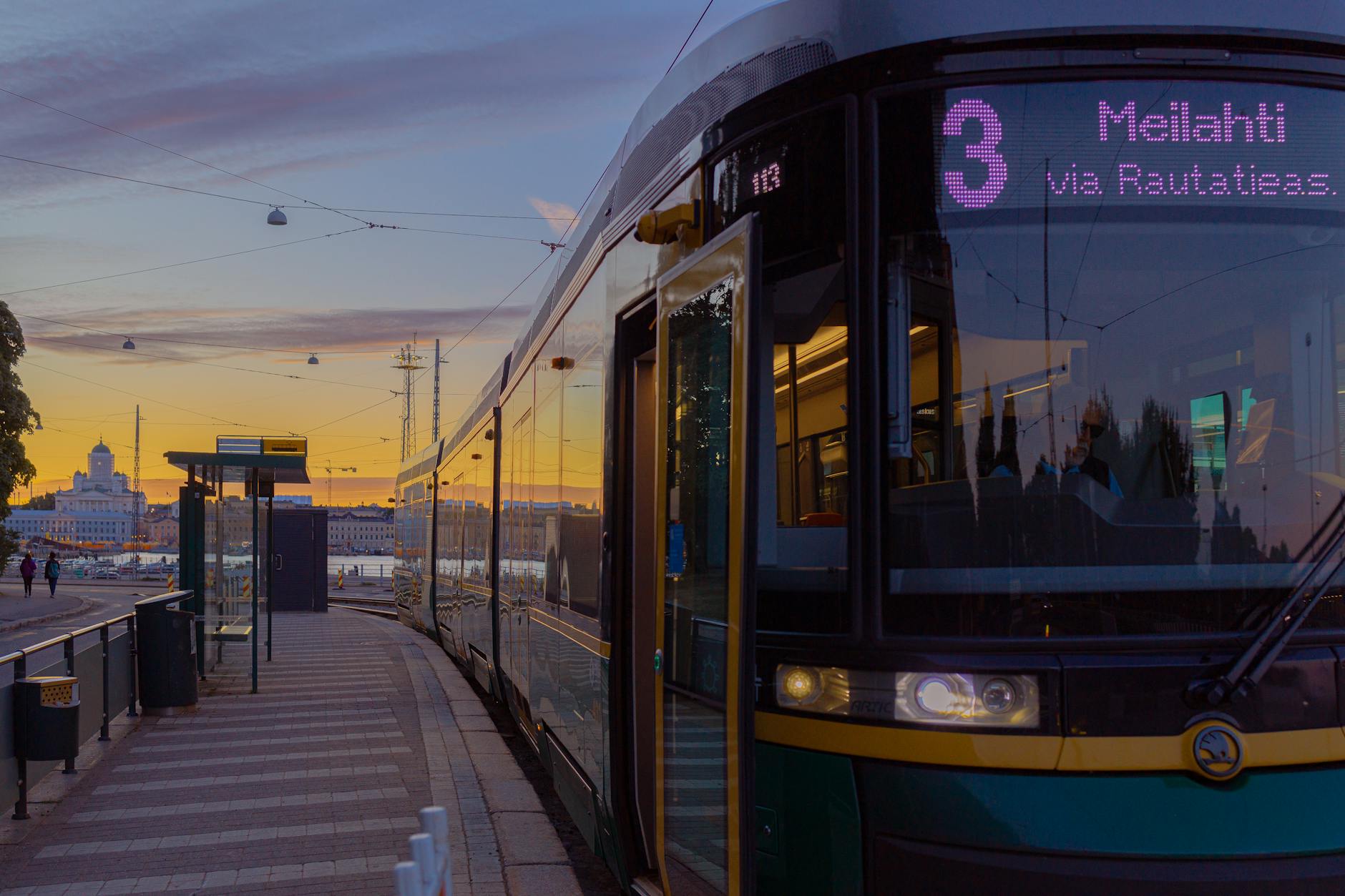 Tram 3 Meilahti via Rautatieas at sunset in Helsinki, Finland.