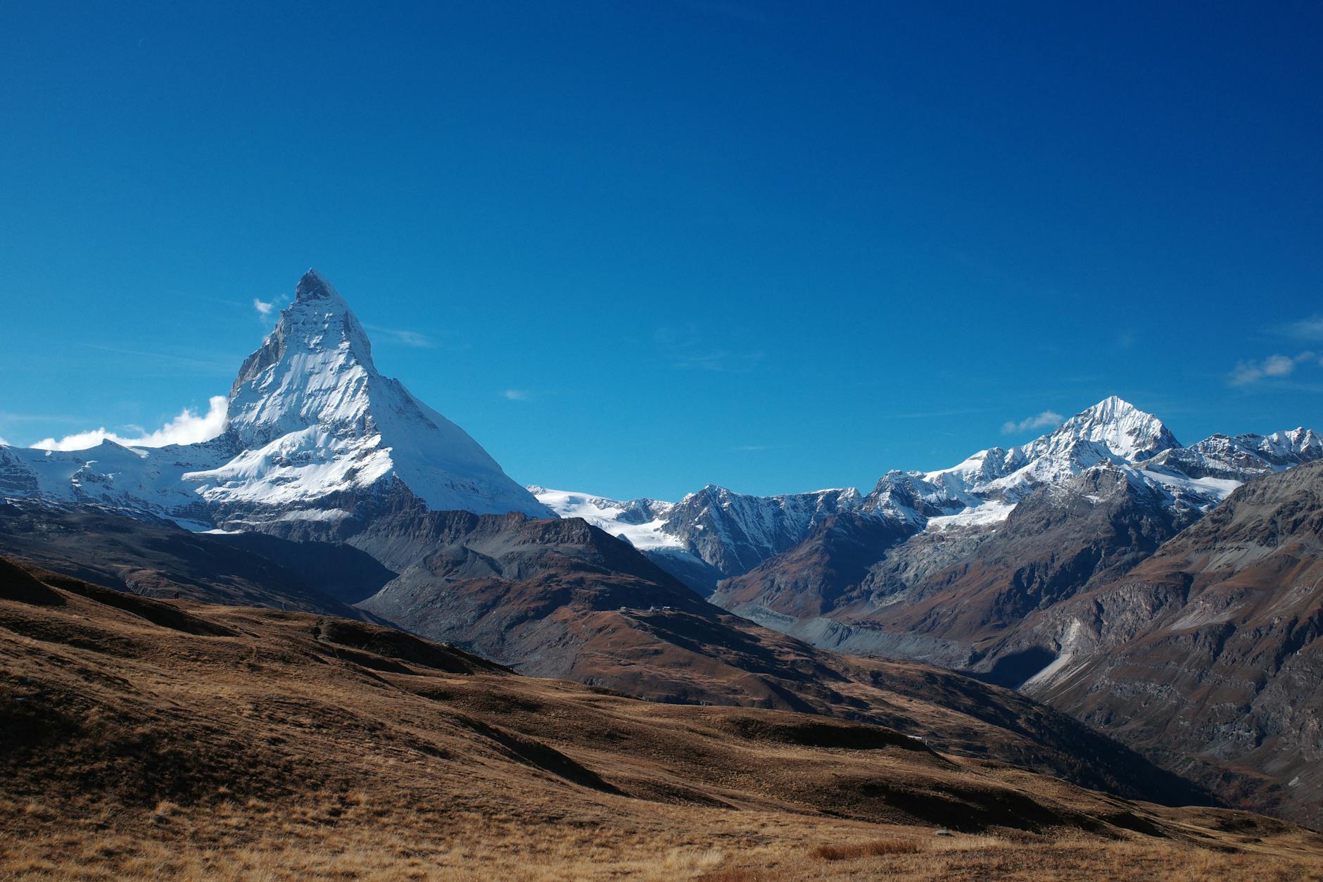 Capture the breathtaking beauty of the Matterhorn mountain in Zermatt with clear skies and majestic peaks.