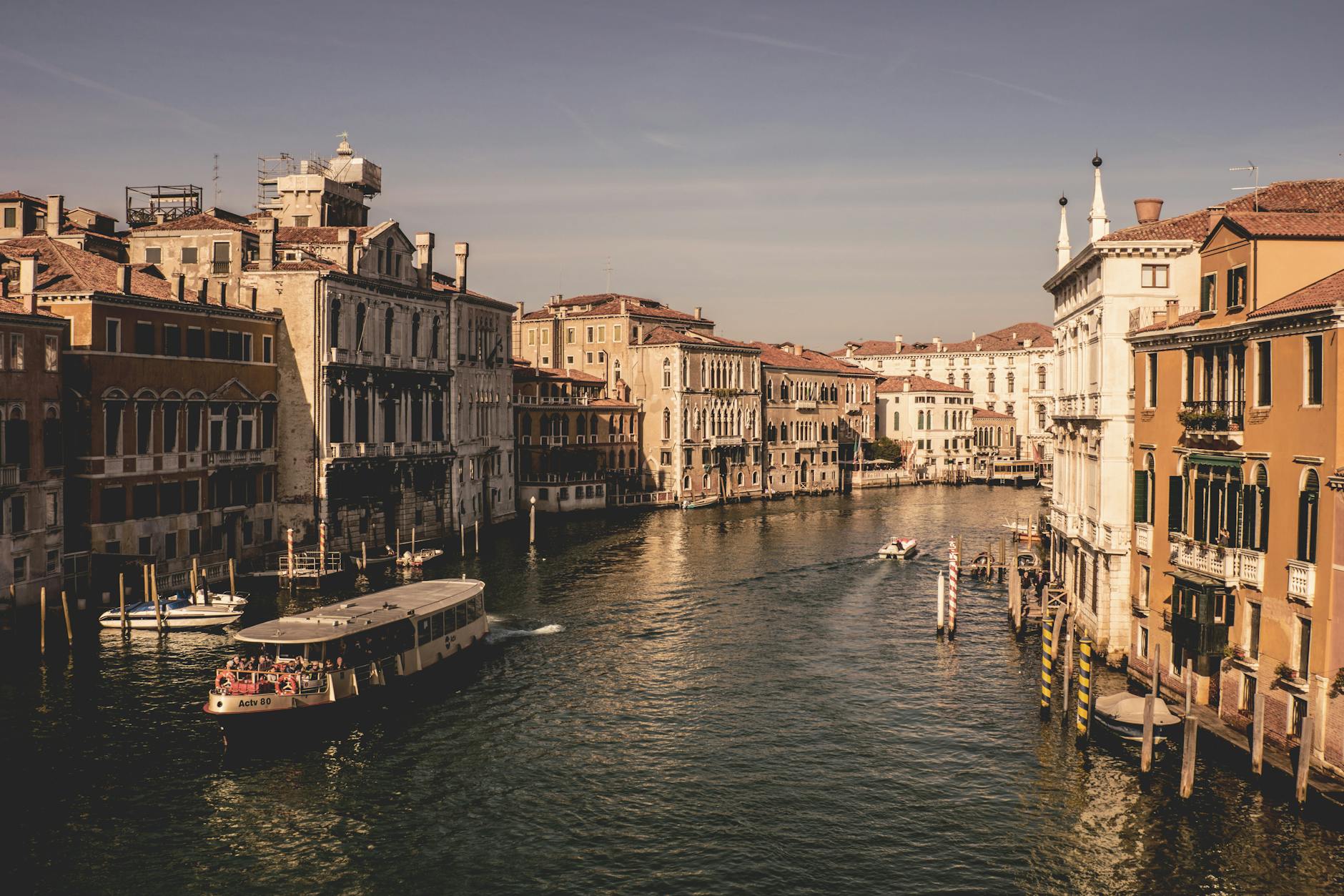 Beautiful view of Venice's Grand Canal showcasing historic architecture and watercraft.