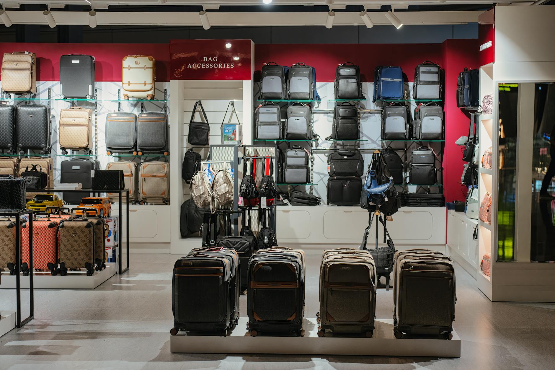 Elegant luggage display in a premium Doha airport shop, Qatar.