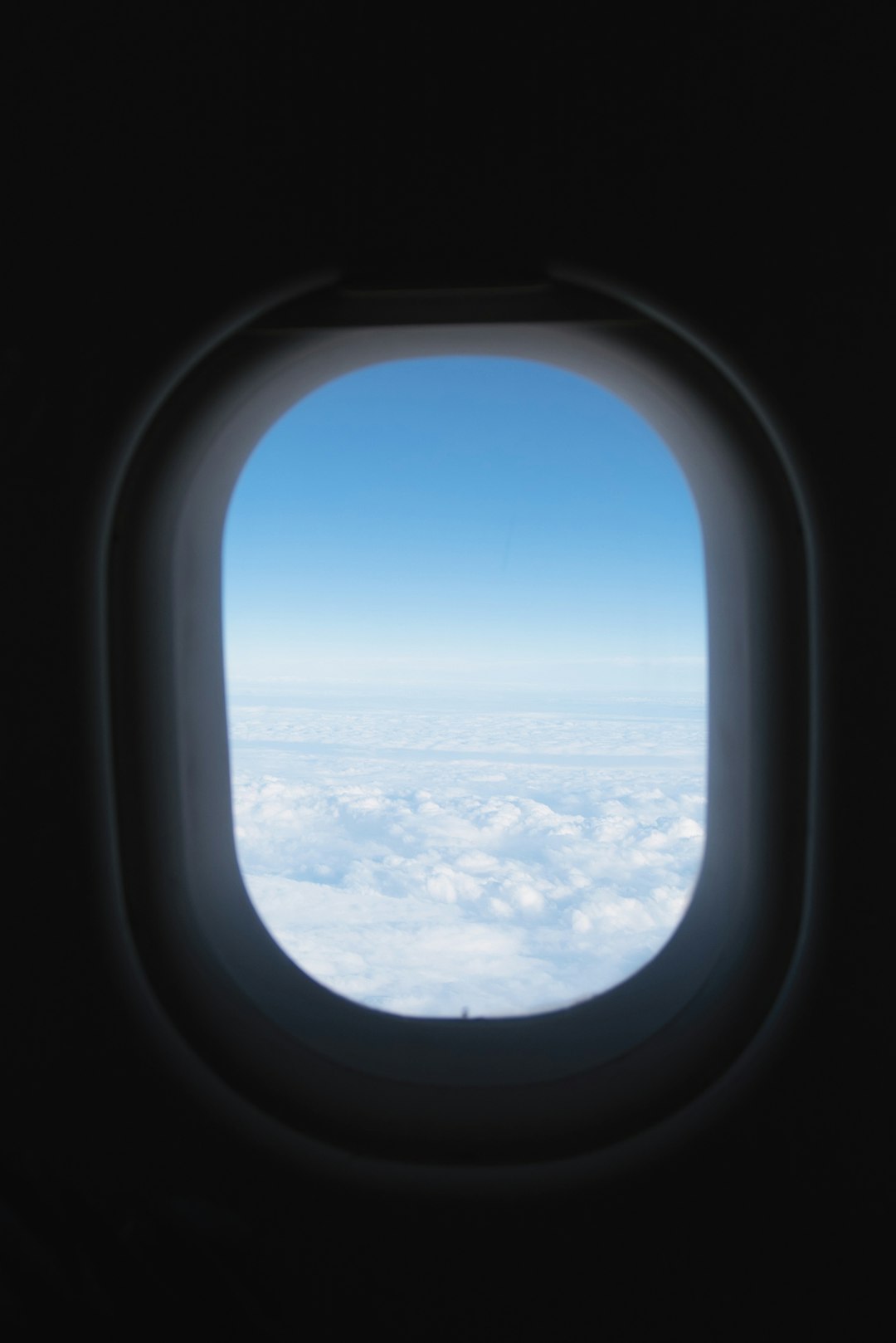 a view of the clouds from an airplane window