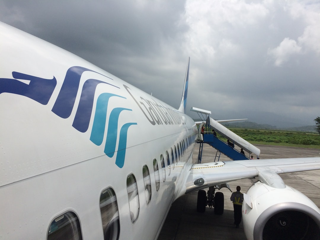 a large jetliner sitting on top of an airport tarmac